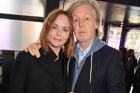 Stella McCartney and Sir Paul McCartney pose backstage at the Stella McCartney show during Paris Fashion Week Womenswear Spring/Summer 2023 at Centre Pompidou on October 3, 2022 in Paris, France