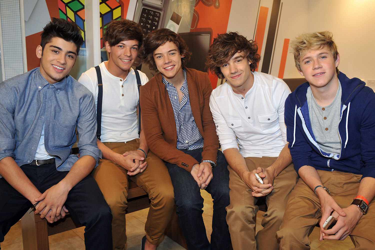 ayn Malik, Louis Tomlinson, Harry Styles, Liam Payne and Niall Horan of One Direction launch their new Nokia handsets at The Carphone Warehouse on October 12, 2011