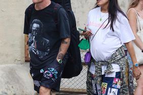 New York, NY - *EXCLUSIVE* - Flea from the Red Hot Chili Peppers, is seen with his pregnant wife Melody Ehsani and the pair is looking stylish in Manhattan’s SoHo area. Flea carries his bass guitar while beating the heat in shorts and turning heads with his bright pink hairdo. Pictured: Flea, Melody Ehsani BACKGRID USA 26 AUGUST 2022 BYLINE MUST READ: BrosNYC / BACKGRID USA: +1 310 798 9111 / usasales@backgrid.com UK: +44 208 344 2007 / uksales@backgrid.com *UK Clients - Pictures Containing Children Please Pixelate Face Prior To Publication*