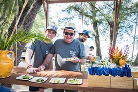 Emeril Lagasse and Son EJ Team Up for Cayman Cookout