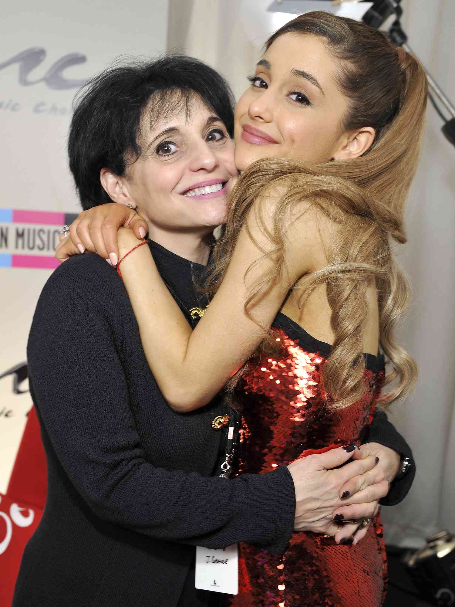 Joan Grande (L) and singer Ariana Grande pose in the Music Choice Lounge backstage at the 2013 American Music Awards