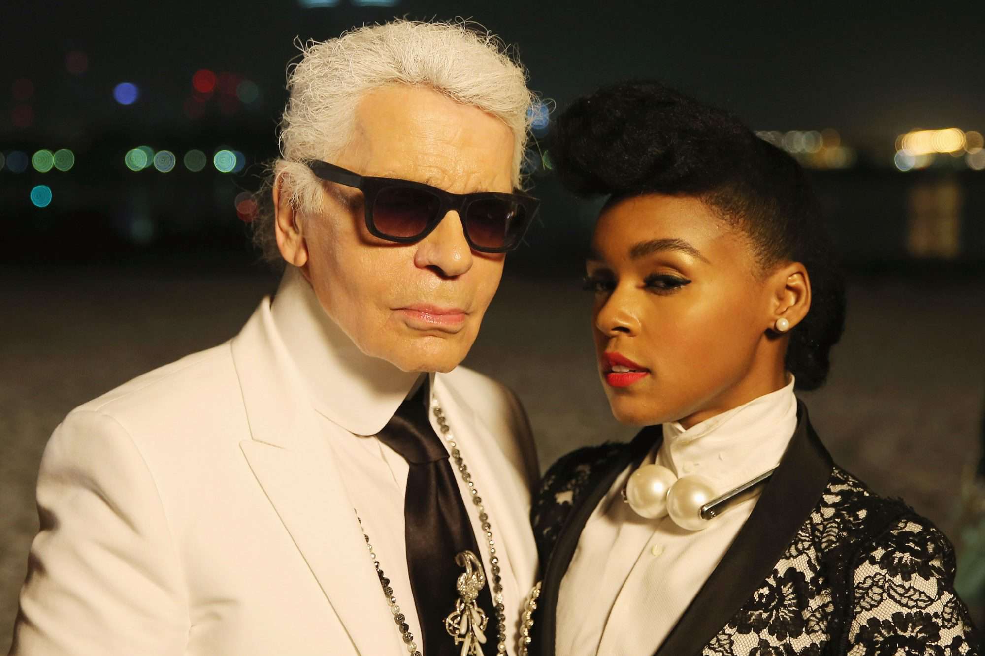 DUBAI, UNITED ARAB EMIRATES - MAY 13: Karl Lagerfeld and Janelle Monae pose for a photograph after the Chanel Cruise Collection 2014/2015 at The Island on May 13, 2014 in Dubai, United Arab Emirates. (Photo by Francois Nel/Getty Images)