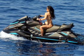 Lauren Sanchez rocks a tiny gold bikini as she rides a jet ski on the Aegean Sea in Greece on June 27, 2024.