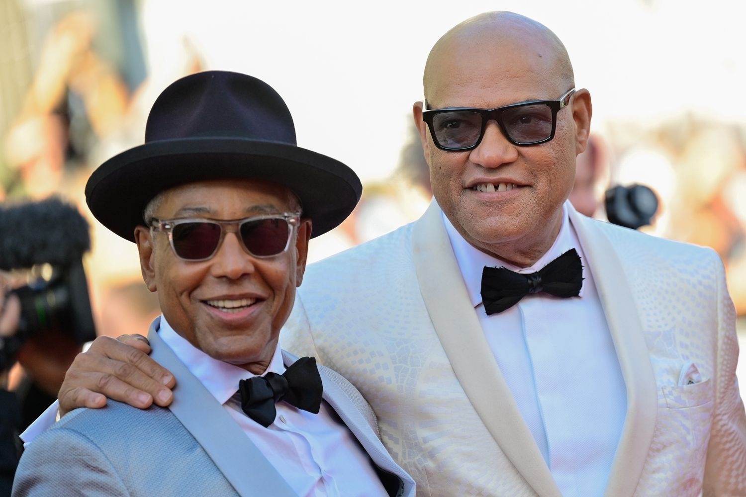 Giancarlo Esposito and Laurence Fishburne attend the "Megalopolis" Red Carpet at the 77th annual Cannes Film 