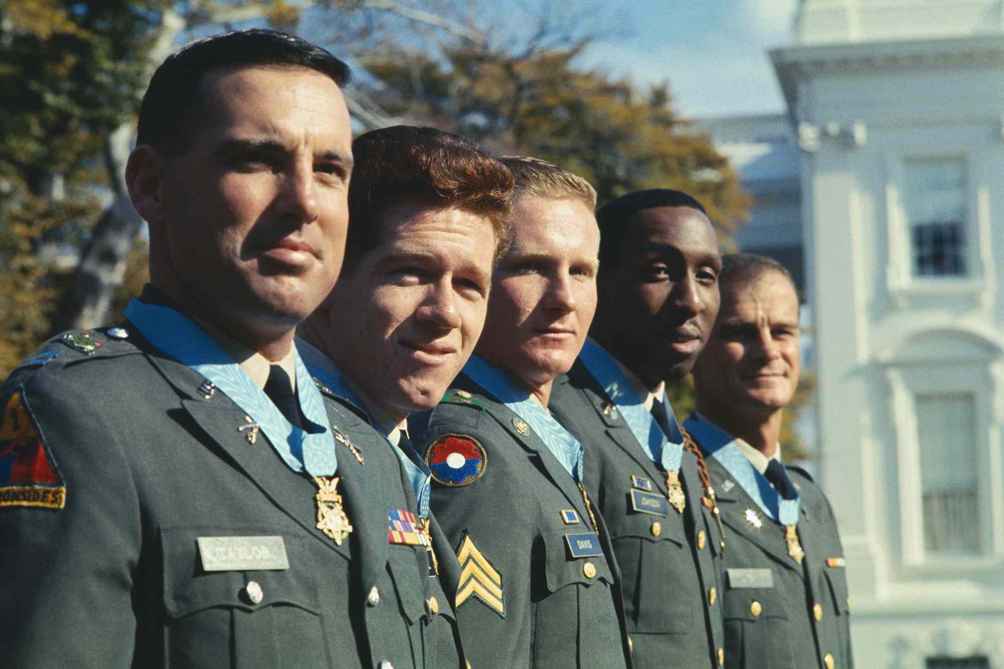 Capt. James A. Taylor, Spc. 4 Gary G. Wetzel, Sgt. Sammy L. Davis, Spc. 5 Dwight. H. Johnson, and Capt. Angelo J. Liteky are presented with the Medal of Honor for heroism at the White House. 