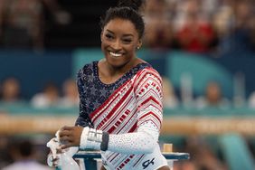  Simone Biles of the United States reacts after she performs her routine on the uneven bars in the Women's Team Artistic Gymnastics Final on day four of the Olympic Games Paris 2024