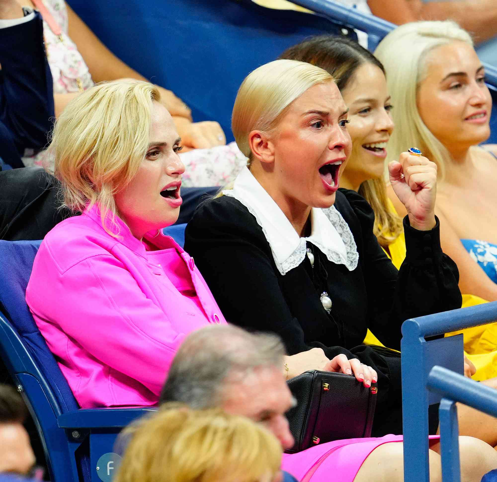 Rebel Wilson and Ramona Agruma attend the Women's Singles First Round match between Serena Williams of the United States and Danka Kovinic of Montenegro on Day One of the 2022 US Open at USTA Billie Jean King National Tennis Center on August 29, 2022 in the Flushing neighborhood of the Queens borough of New York City.