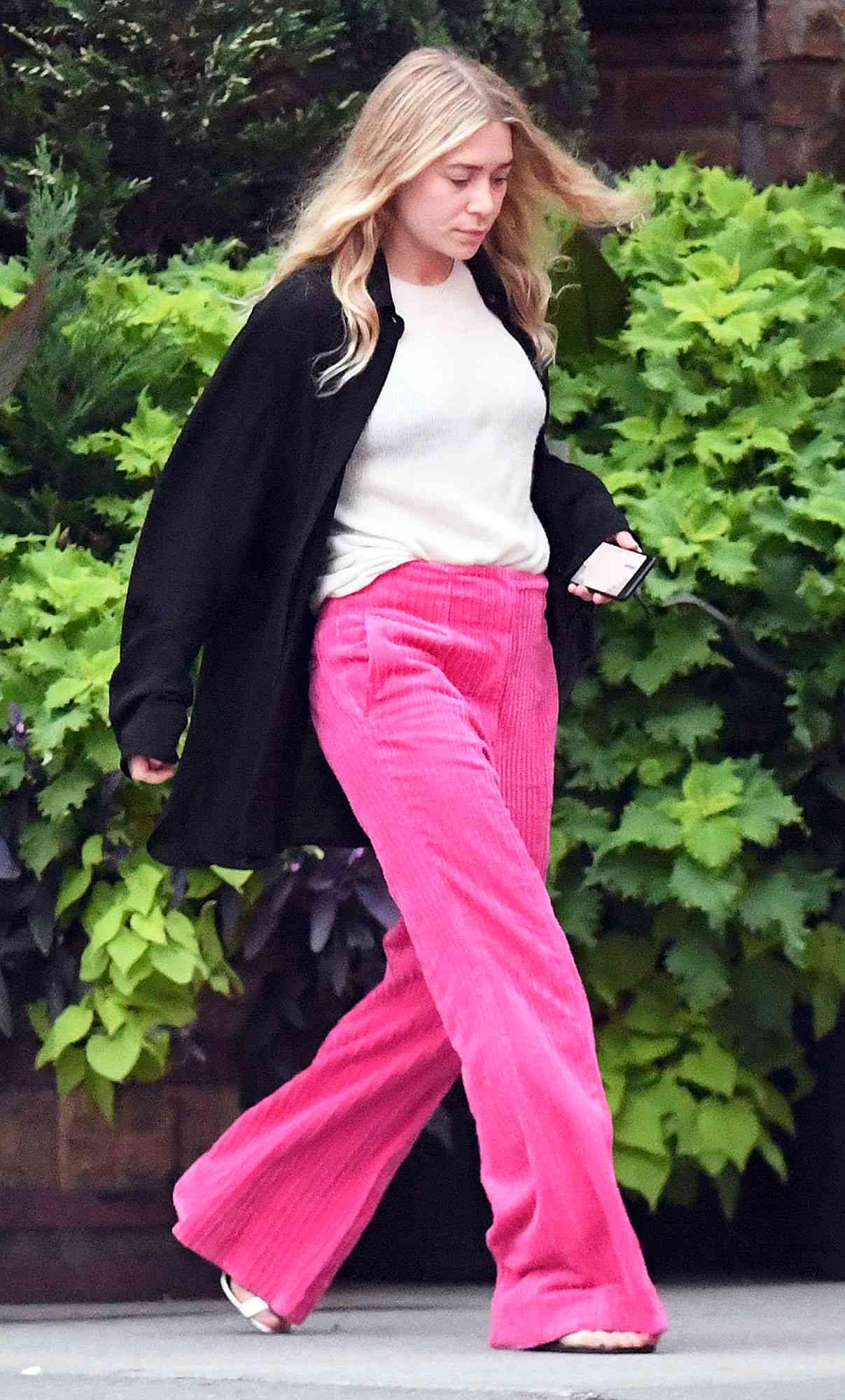 EXCLUSIVE: Ashley Olsen Spotted leaving her Hotel wearing a pink pants