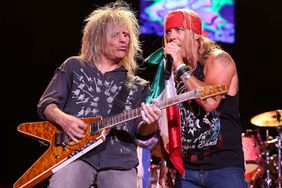 MEXICO CITY, MEXICO - SEPTEMBER 08: C.C. Deville and Bret Michaels of Posion perform onstage at Arena Ciudad de México on September 8, 2012 in Mexico City, Mexico. (Photo by Victor Chavez/WireImage)