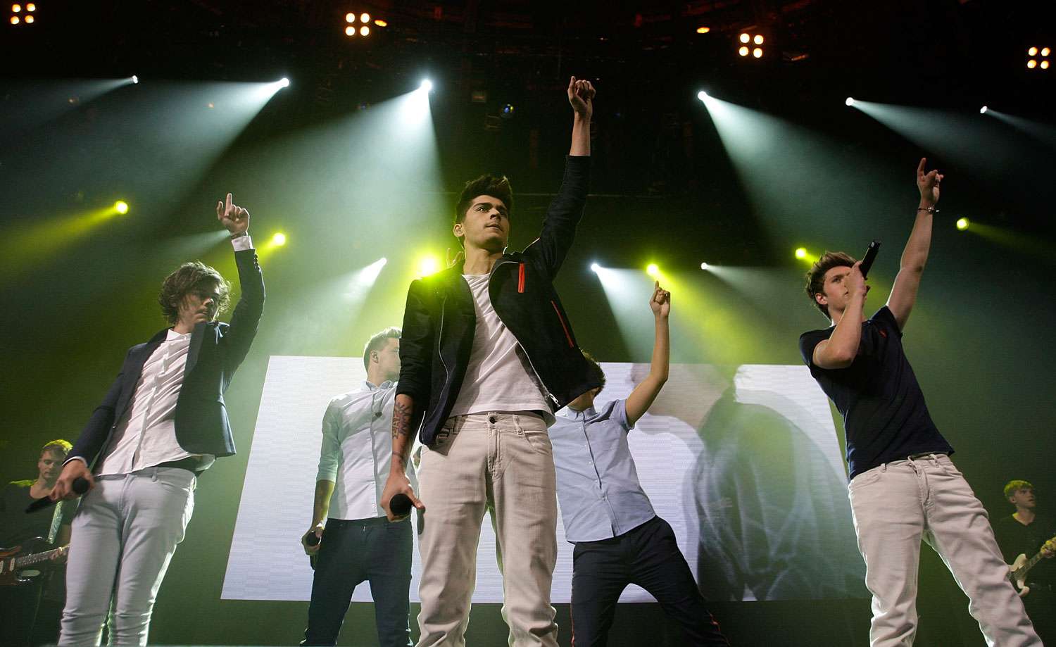 Harry Styles, Louis Tomlinson, Zayn Malik, Liam Payne and Niall Horan of One Direction perform on stage at The Roundhouse on September 20, 2012 in London, United Kingdom.