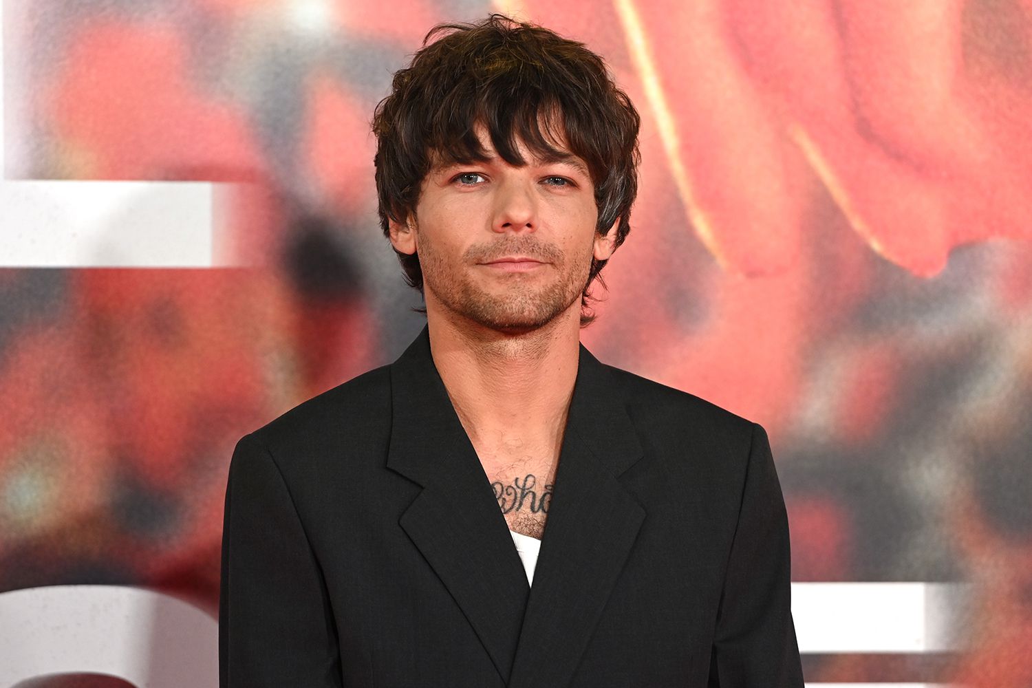 Louis Tomlinson arrives at the "All Of Those Voices" UK Premiere
