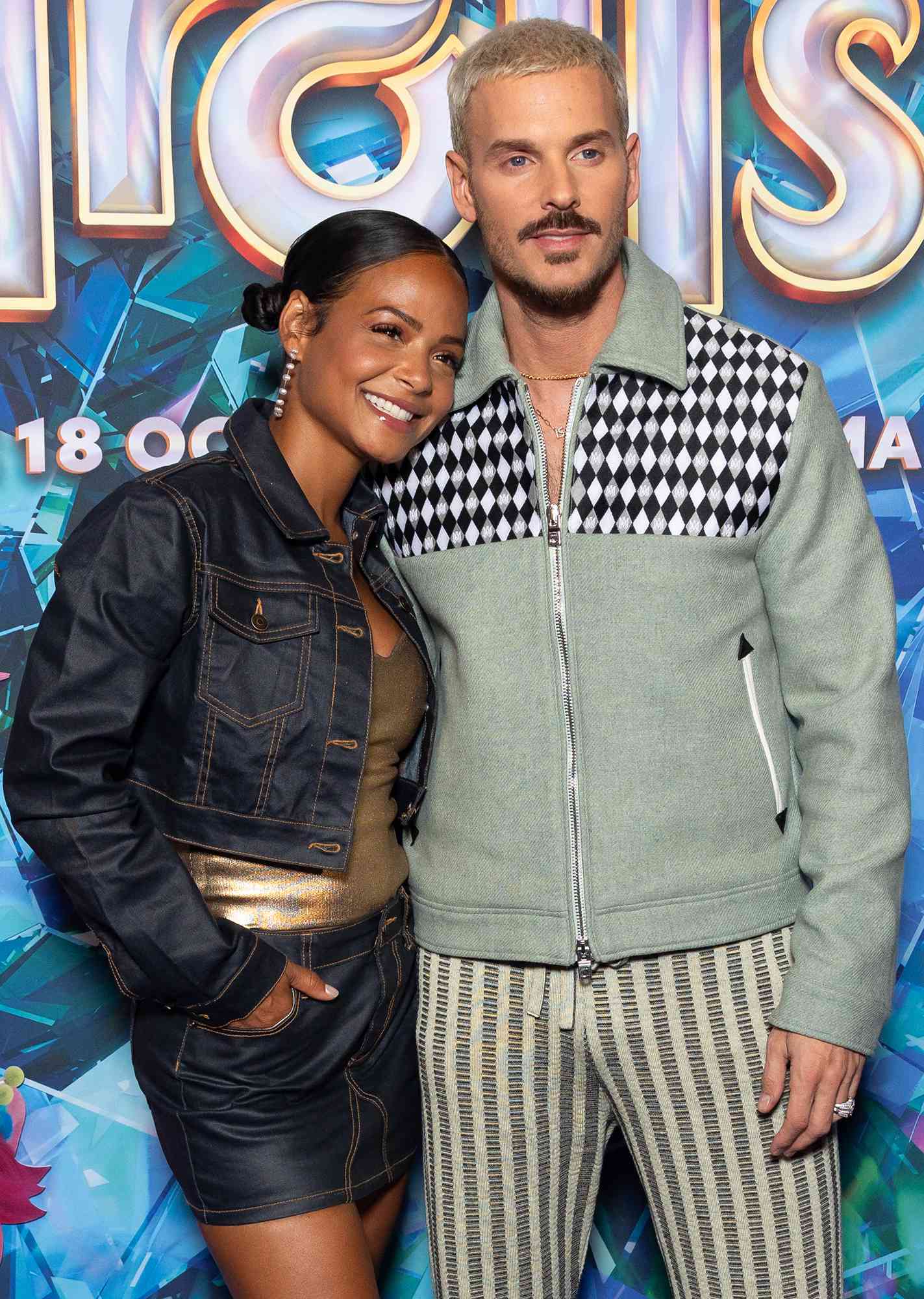 Christina Milian and Matt Pokora attend the "Trolls 3" Premiere on October 11, 2023 in Paris, France.