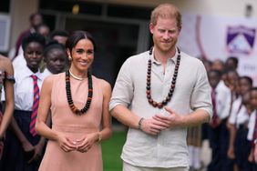 Prince Harry and Meghan visit children at the Lights Academy in Abuja, Nigeria, Friday, May 10, 2024. Prince Harry and his wife Meghan have arrived in Nigeria to champion the Invictus Games, which he founded to aid the rehabilitation of wounded and sick servicemembers and veterans.