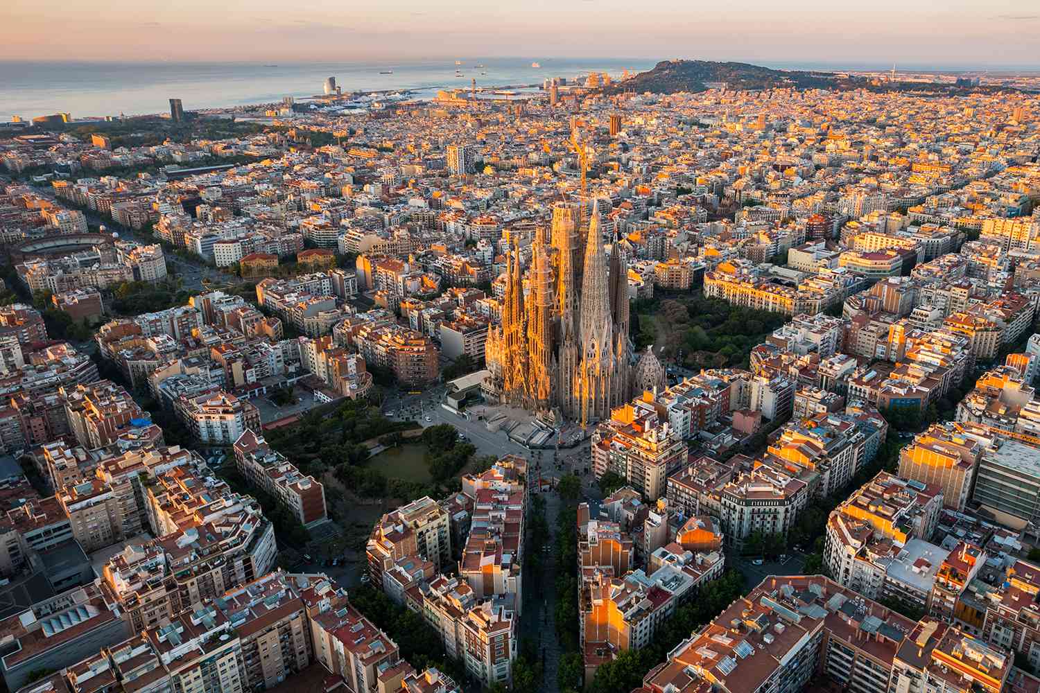 Barcelona City Skyline with Sagrada Familia Cathedral at sunrise. 