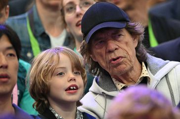 Mick Jagger and his son Deveraux at the Paris Olympics