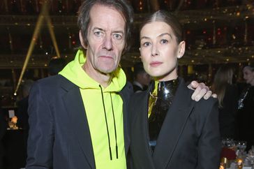 Robie Uniacke and Rosamund Pike attend The Fashion Awards 2018 on December 10, 2018 in London, England. 