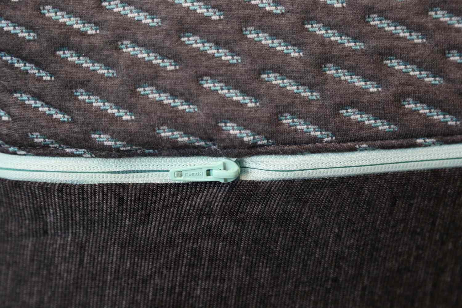 Close-up of the zipper on the Tuft & Needle Mint Hybrid Mattress
