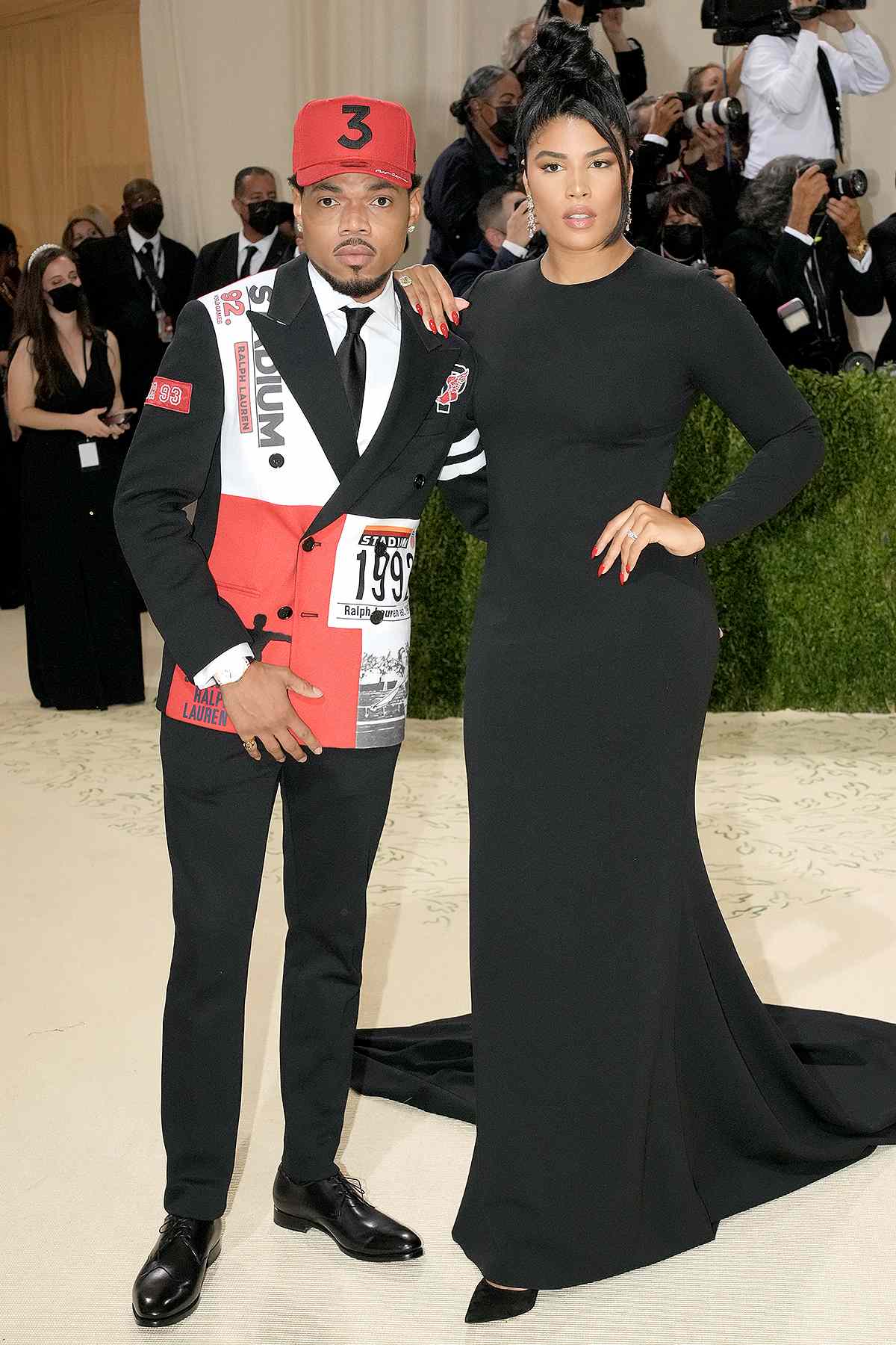 Chance the Rapper caption and Kirsten Corley attend The 2021 Met Gala Celebrating In America: A Lexicon Of Fashion at Metropolitan Museum of Art on September 13, 2021 in New York City.