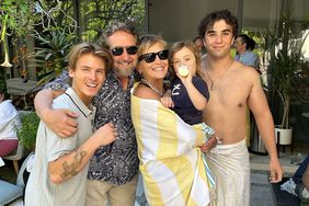 Sharon Stone Parties with Son Roan at Fourth of July Pool Party