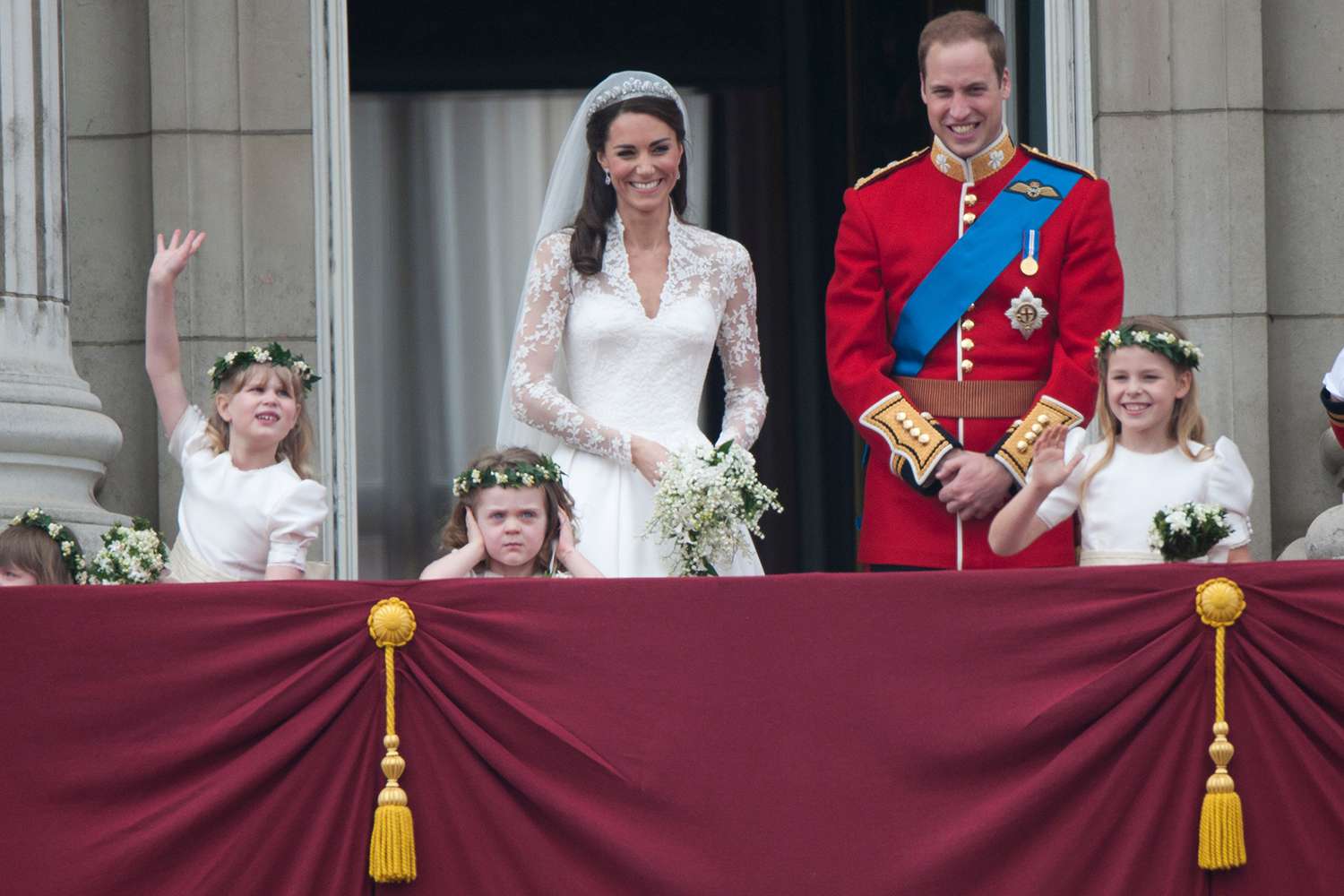 TRH Catherine, Duchess of Cambridge and Prince William, Duke of Cambridge on the balcony at Buckingham Palace with Bridesmaids Margarita Armstrong-Jones (Right) And Grace Van Cutsem (Middle) And Lady Louise (Left), following their wedding at Westminster Abbey on April 29, 2011 in London, England.