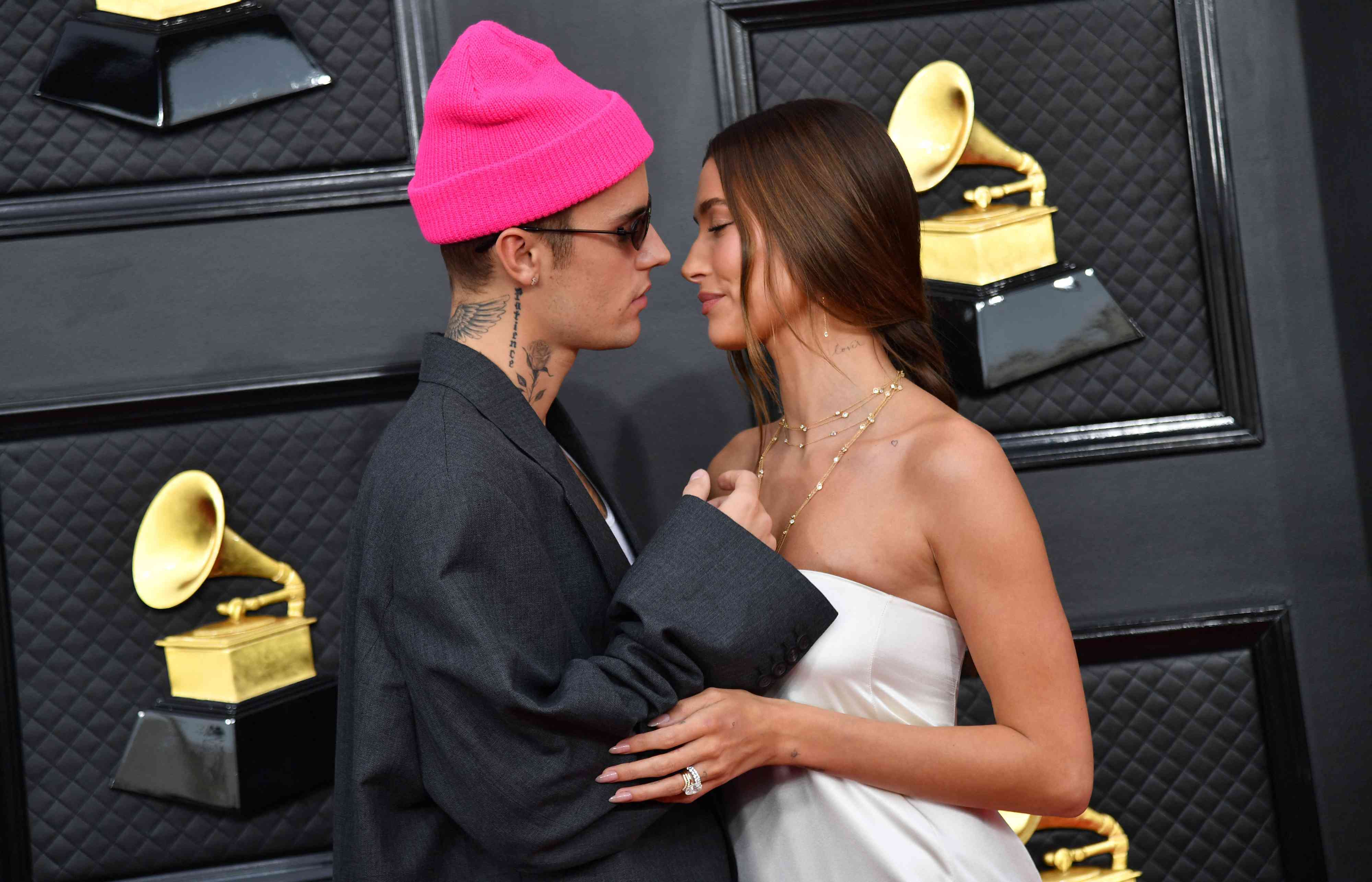 Justin and Hailey Bieber About to Kiss on Red Carpet at 2022 Grammys