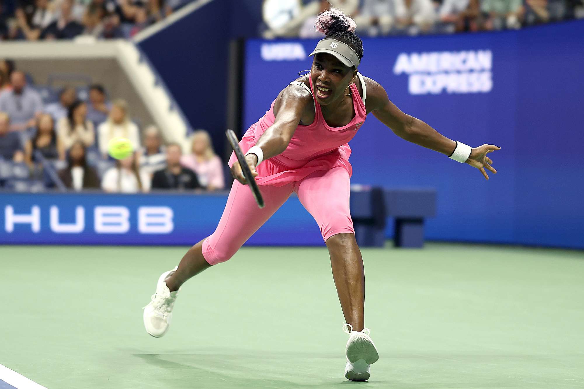 Venus Williams of the United States returns a shot against Greet Minnen of Belgium during their Women's Singles First Round match on Day Two of the 2023 US Open