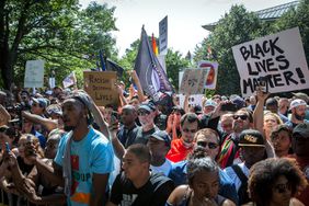 Counter protestors gather during a planned Ku Klux Klan protest on July 8, 2017 in Charlottesville, Virginia.