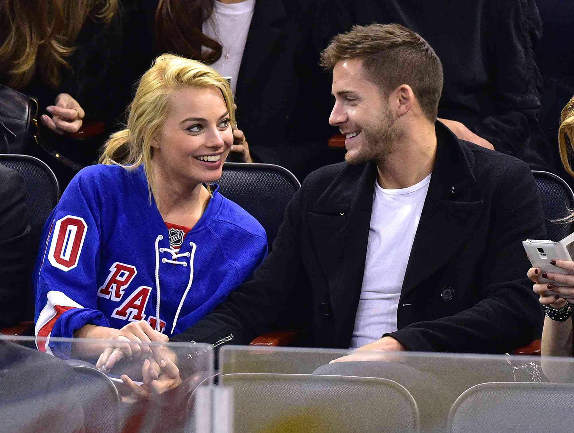 Margot Robbie and Tom Ackerley attend the Arizona Coyotes vs New York Rangers game at Madison Square Garden on February 26, 2015 in New York City