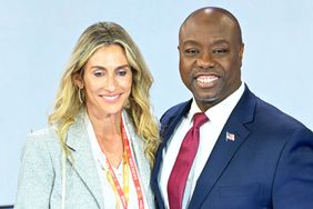 Sen. Tim Scott of South Carolina poses on stage with Mindy Noce after the Republican Presidential Debate at the Adrienne Arsht Center for the Performing Arts on November 8, 2023. (