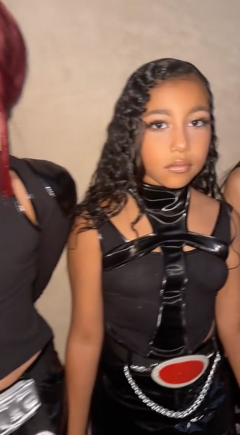 North West Looks All Grown Up as She Heads to a Halloween Party with Her Friends