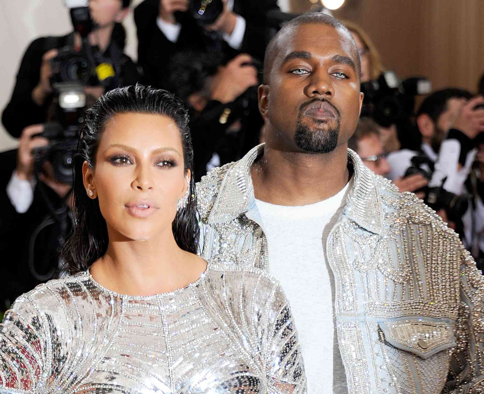 Kim Kardashian West and Kanye West attends "Manus x Machina: Fashion In An Age Of Technology" Costume Institute Gala