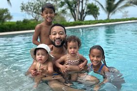 John legend shares vacation photo posed with his children in pool instagram 07 01 24