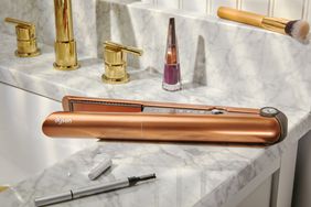 Dyson Corrale Hair Straightener on a bathroom marble countertop