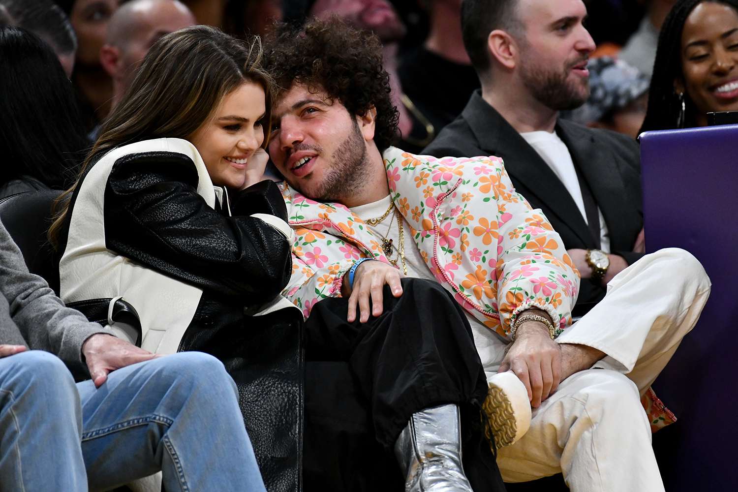 Selena Gomez and Benny Blanco attend a basketball game between the Los Angeles Lakers and the Miami Heat