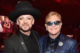 Recording artist Boy George (L) and host Sir Elton John attend the 24th Annual Elton John AIDS Foundation's Oscar Viewing Party at The City of West Hollywood Park on February 28, 2016 in West Hollywood, California.