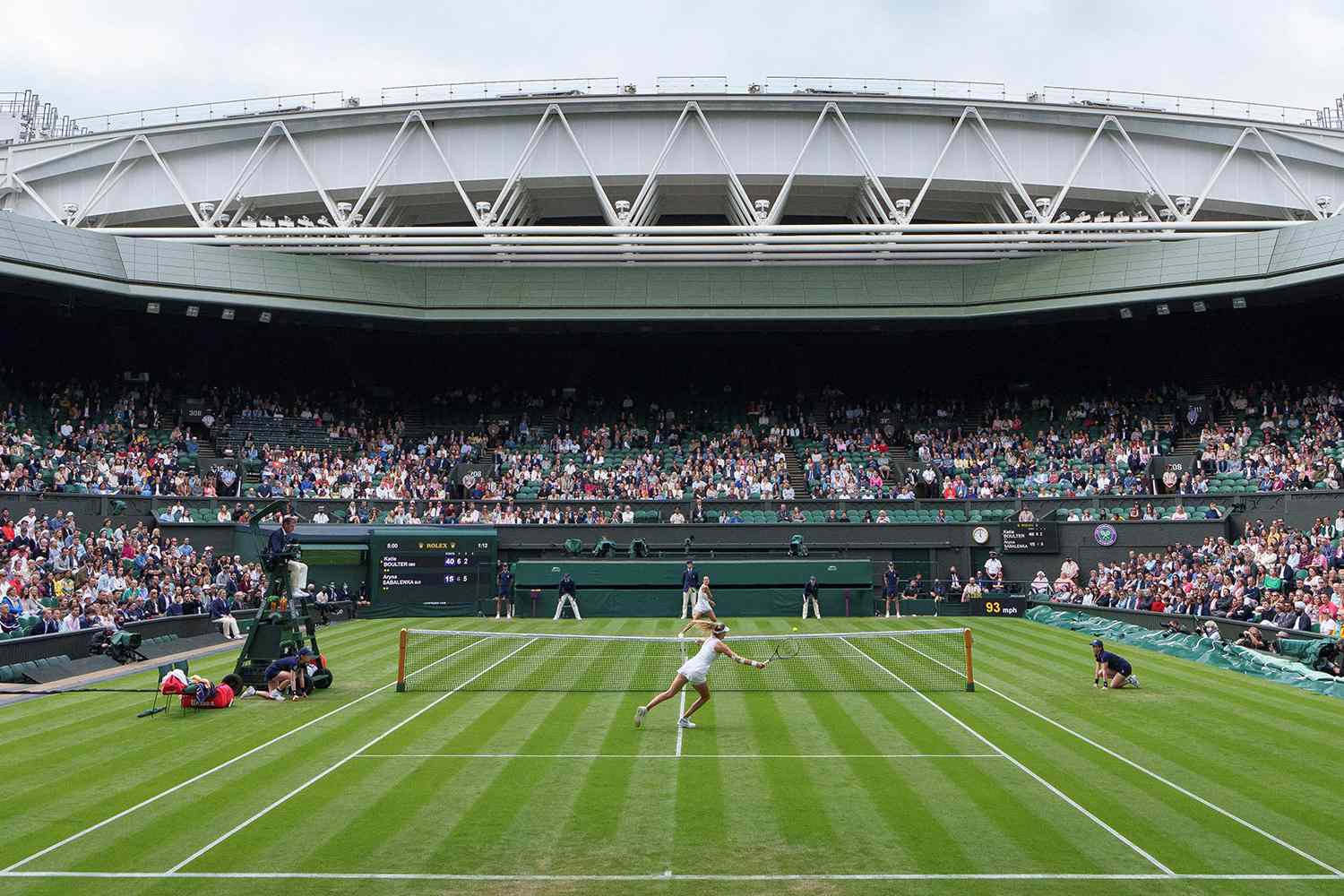  A general view of play on Centre Court, with the roof open, as Britain's Katie Boulter plays against Belarus's Aryna Sabalenka during their women's singles second round match on the third day of the 2021 Wimbledon Championships