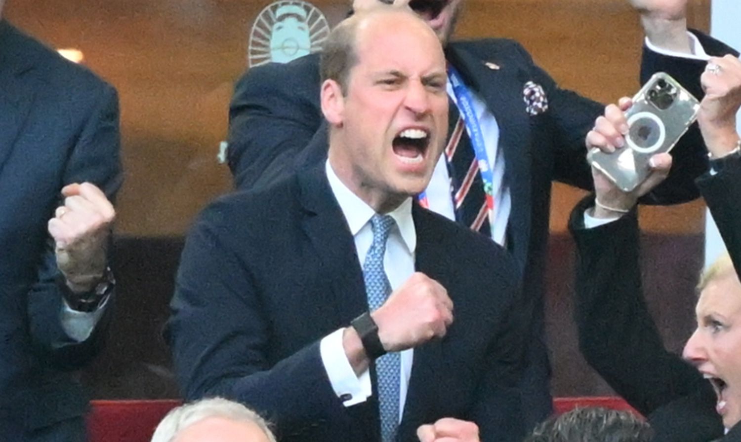 Prince William of Wales at the stands, celebrate victory at the end of the UEFA Euro 2024 quarter-final football match between England and Switzerland at the Duesseldorf Arena in Duesseldorf on July 6, 2024