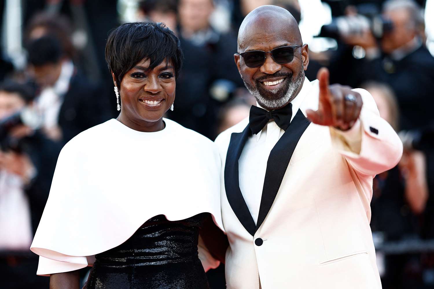 Viola Davis (L) and her husband US actor Julius Tennon arrive for the Closing Ceremony of the 77th edition of the Cannes Film 