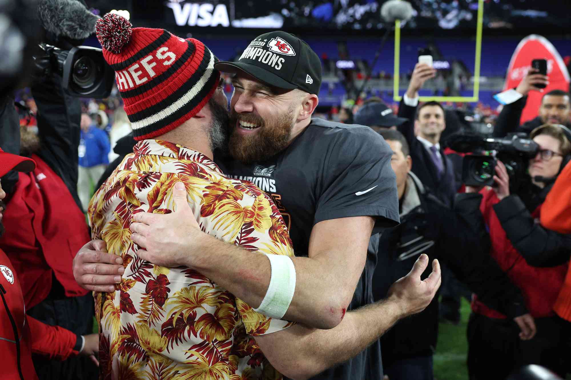 Travis Kelce 87 of the Kansas City Chiefs celebrates with his brother Jason Kelce