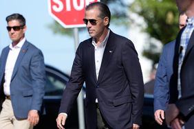 Hunter Biden, center, leaves St. Edmond Catholic Church in Rehoboth Beach, Del.