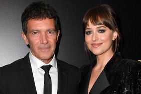 Antonio Banderas, winner of the Hollywood Actor Award, and Dakota Johnson pose in the press room during the 23rd Annual Hollywood Film Awards at The Beverly Hilton Hotel on November 03, 2019 in Beverly Hills, California.