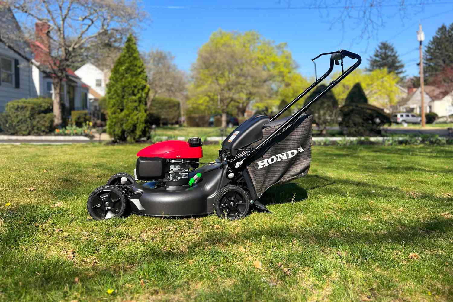 Honda HRN216VKA 21-Inch Gas Self-Propelled Lawn Mower displayed on a lawn