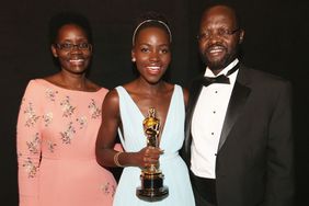 Dorothy Nyong'o, actress Lupita Nyong'o, and Peter Anyang' Nyong'o backstage during the Oscars on March 2, 2014 in Hollywood, California. 