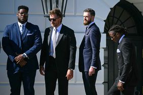 Kansas City Chiefs kicker Harrison Butker (3rd R) attends a celebration for the Kansas City Chiefs, 2024 Super Bowl champions, hosted by US President Joe Biden on the South Lawn of the White House in Washington, DC, on May 31, 2024.