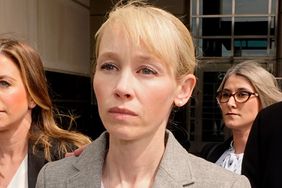 Sherri Papini of Redding leaves the federal courthouse accompanied by her attorney, William Portanova, right, after her arraignment in Sacramento, Calif., Wednesday, April 13, 2022.