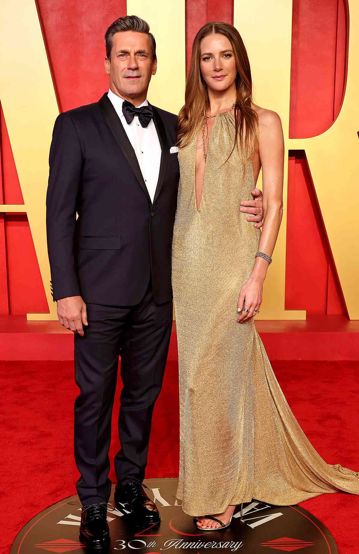 Jon Hamm and Anna Osceola attend the 2024 Vanity Fair Oscar Party Hosted By Radhika Jones at Wallis Annenberg Center for the Performing Arts on March 10, 2024 in Beverly Hills, California. 