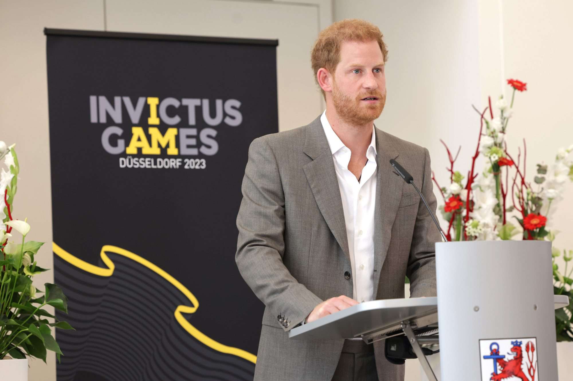 DUSSELDORF, GERMANY - SEPTEMBER 06: Prince Harry, Duke of Sussex makes a speech at town hall during the Invictus Games Dusseldorf 2023 - One Year To Go events, on September 06, 2022 in Dusseldorf, Germany. The Invictus Games is an international multi-sport event first held in 2014, for wounded, injured and sick servicemen and women, both serving and veterans. The Games were founded by Prince Harry, Duke of Sussex who's inspiration came from his visit to the Warrior Games in the United States, where he witnessed the ability of sport to help both psychologically and physically. (Photo by Chris Jackson/Getty Images for Invictus Games Dusseldorf 2023)