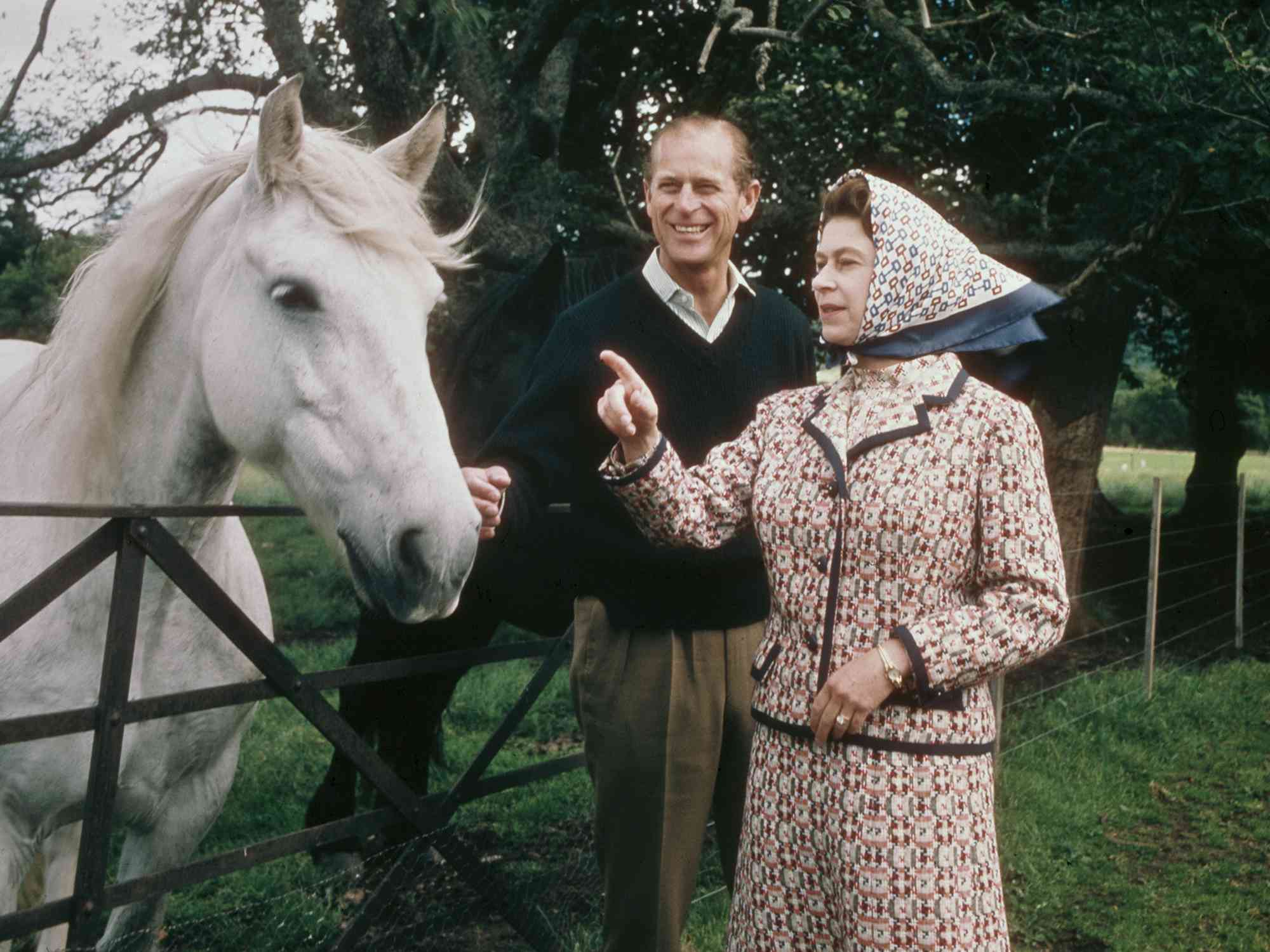 Queen Elizabeth II and Prince Philip visit a farm on the Balmoral estate in Scotland, during their Silver Wedding anniversary year, September 1972