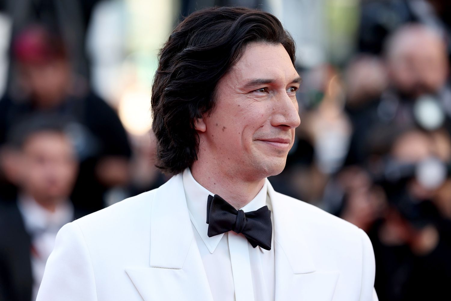 Adam Driver attends the "Megalopolis" Red Carpet at the 77th annual Cannes Film Festival at Palais des Festivals on 