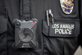 A Los Angeles police officer wear an AXON body camera during the Immigrants Make America Great March to protest actions being taken by the Trump administration on February 18, 2017 in Los Angeles, California. Protesters are calling for an end to stepped up ICE raids and deportations, and that health care be provided for documented and undocumented people.